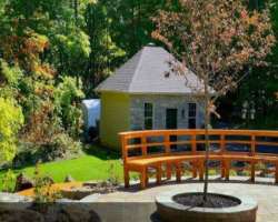The garden is home to numerous plants and trees in The garden is home to numerous plants and trees including vegetable plants, perennials, tropical ornamental trees and shrubs, biennials, and roses amo